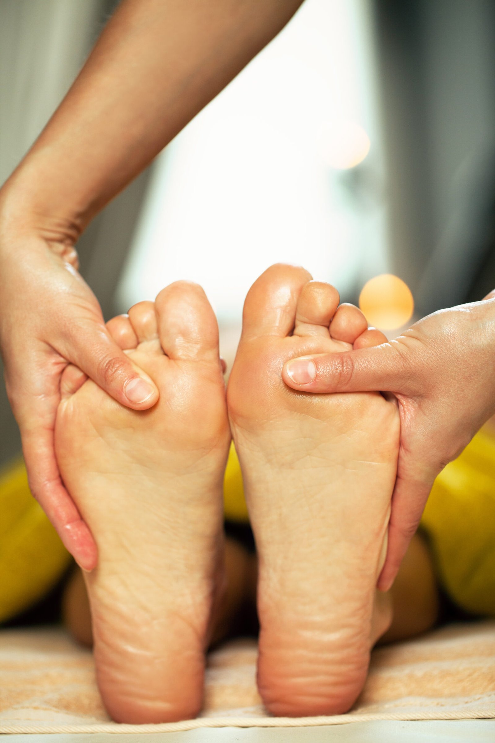 Photo de pieds en train de se faire masser